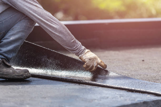 Professional Waterproofing technician working in Manassas, VA